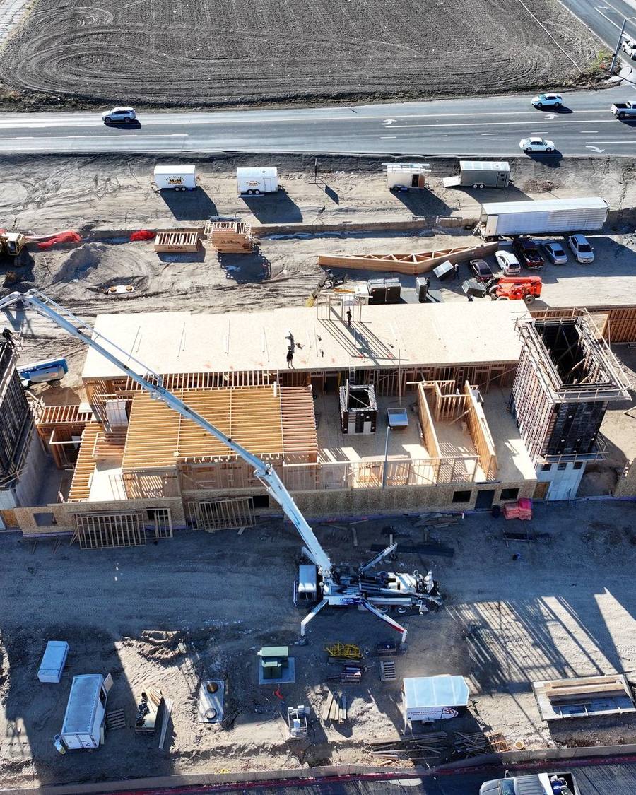Aerial view of a D&D commercial building during framing and concrete work